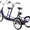 TANDEM TRICYCLE AVEC ENFANT DEVANT